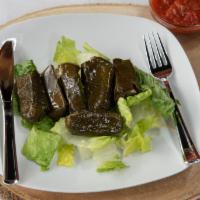 6 Piece Grape Leaves · Served with tzatziki sauce.