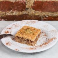Kataifi · Sweet pastry made of extremely thin shredded dough layered with chopped nuts and honey syrup...