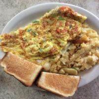 Western Omelette · Served with french fries and toast.