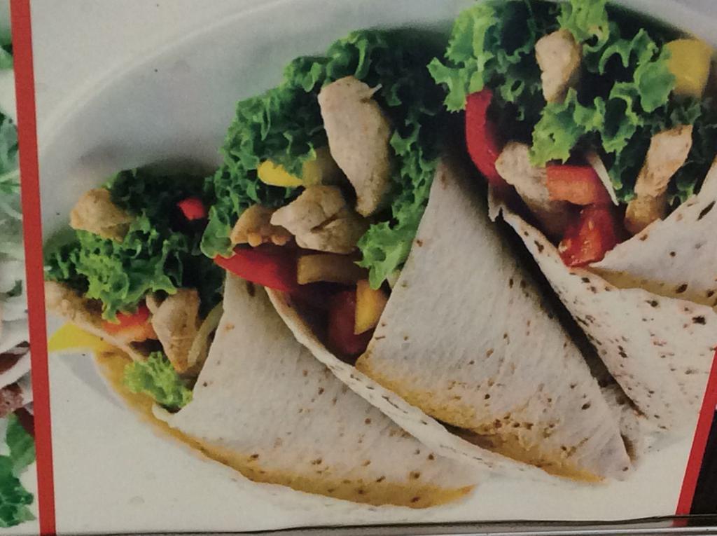 Grilled Chicken Wrap · Grilled chicken, lettuce and tomato.