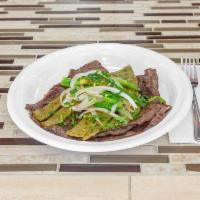 Cecina Asada con nopales, rajas y cebolla  · Salted beef with grilled cactus, sauteed onions and roasted jalapenos. Served with rice, bea...