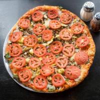 Very Veggie · Mozzarella cheese, spinach, red onions, garlic, mushrooms, artichokes and fresh Roma tomatoes.