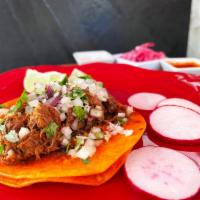 Tacos · 2 corn tortillas, birria or chicken, onions and cilantro.