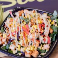 My Spicy Chicken Bowl · Served with baby kale, cajun grilled chicken, cheddar, corn, lime chipotle vinaigrette, orga...