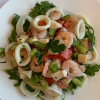 Seafood Salad · Shrimp, calamari, octopus, capers red onion, oregano and virgin olive oil.