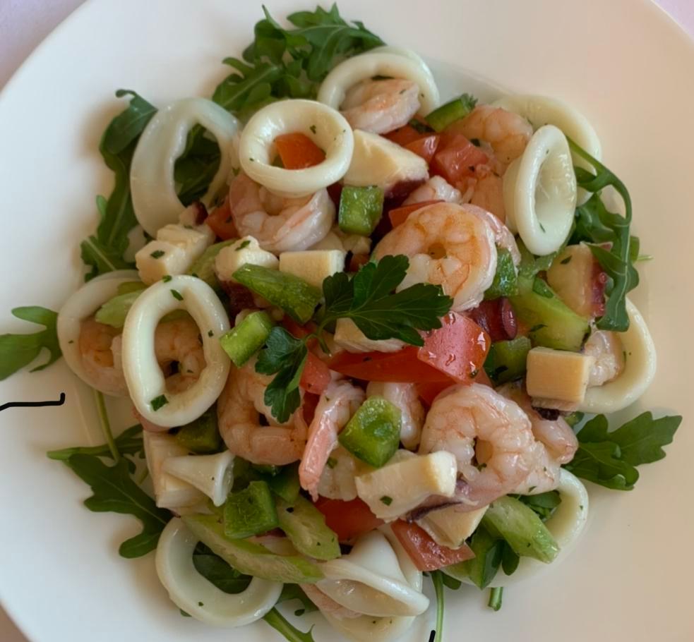 Seafood Salad · Shrimp, calamari, octopus, capers red onion, oregano and virgin olive oil.