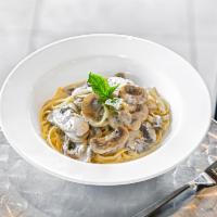 Pasta Ai Funghi with White Truffle oil · Pasta, mushrooms, Parmesan cheese, cream sauce with white truffle oil