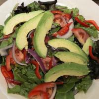 Avocado Salad · Sliced avocado over mesclun spring mix, red peppers, tomatoes and red onions.