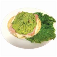 25A. Arepa Jamon, Queso y Guacamole · Fried corn cake topped with ham, cheese and guacamole.
