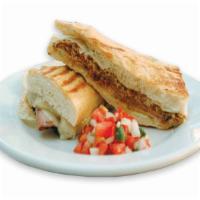 66. Sandwich de Bistec · Steak strips, lettuce, tomate and sauteed onions.
