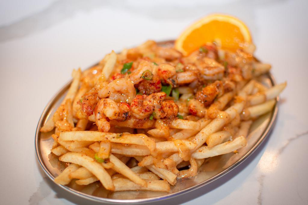 Om Goodness Fries with French Fries · Shrimp, crawfish and green onions sauteed in our signature sweet and tangy sauce pour over your choice of carb and topped off with our creamy aioli sauce. So Good! 