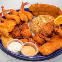 The Ultimate Seafood Platter · 2 fish, 12 shrimp, 6 scallops and 1 soft shell crab.