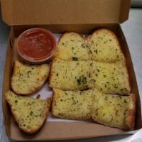 Garlic Bread · Served with our homemade marinara sauce. Add cheese for an extra charge.