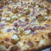 Chicken Cordon Bleu Pizza · 1000 Island base, mozzarella, Red Tyson American chicken, premium ham, topped with fresh par...