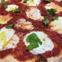 Margherita pizza · Pureed Italian plum tomatoes, fresh OVOLINE mozzarella, fresh basil and extra virgin olive o...