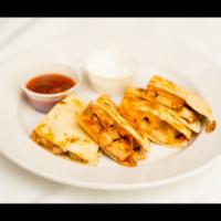 Chicken Quesadilla · Chicken with cheddar and Monterey jack cheese sandwiched in a flour tortilla shell.