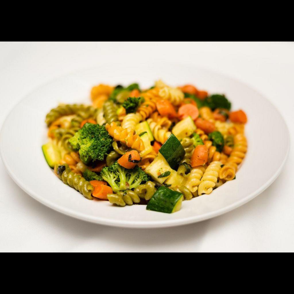 Pasta Primavera · Tri-color pasta with carrots, broccoli and zucchini tossed in a basil garlic and oil or marinara sauce.