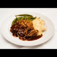 Old Fashioned Chopped Steak · Ground beef and veal seared cook in a marinara brown sauce topped with fried onions.