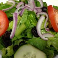 Garden Salad · Romaine, fresh tomatoes, cucumber, onions and black olives, served with bread and your choic...