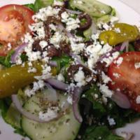 Greek Salad · Romaine, cucumbers, tomatoes, pepperoncinis, onions, kalamata olives, feta cheese and oregan...