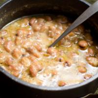 Ful Fava Beans · Ful fava beans served with onions, garlic, and tomato, toped with oliv oile and fresh cut ci...