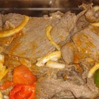 10. Pepper Steak Platter · Served with rice and beans.