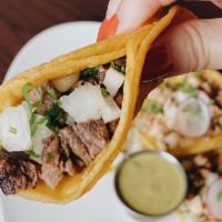 Street Tacos · 5 pieces. Skirt, pastor, or carnitas, cilantro, onions, radish, and side of chicharron charr...