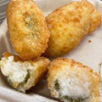 Jalapeno Poppers · Cream cheese filled jalapeño poppers with your choice of dipping sauce