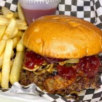 Deluxe PB&J Burger · All beef patty, creamy peanut butter, strawberry jam, grilled sweet onion, bacon, topped wit...