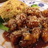 C10. Sesame Chicken · Served in a sweet sauce served with sesame seeds.