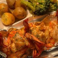 Jumbo Grilled Shrimp Stuffed with Crab Meat Platter, Served with Broccoli and Potatoes · Served with broccoli and potatoes.