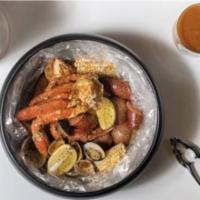 Snow Crab Cluster Boil · Minimum 2 Items for 1/2 LB. Comes with Corn and Potatoes
