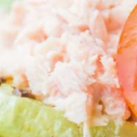 Chicken Salad · Chicken salad, romaine lettuce, tomato, cucumbers, green peppers, and red onions.