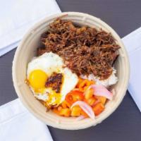 Homemade Corned Beef Rice Bowl · Cured beef, caramelized garlic and onion.