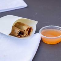 Lumpia · 2 pieces. Filipino style pork egg roll, house-made sweet-spicy dip. 
