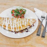 Quesadilla · 3 corn large flour tortilla stuffed with melted cheese topped with crema and queso, sered wi...