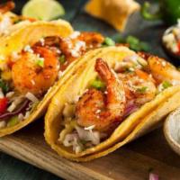 Taco de Camaron · Shrimp taco.