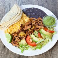 Mexican Platter · Served with rice, beans, salad, tortillas and sauce with any meat  (chicken, beef, spicy por...