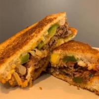 Hickory Habanero Melt Sandwich · Sliced brisket with mayo, hickory habanero BBQ sauce, smoked Gouda, and sauteed peppers and ...