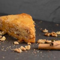 Homemade Greek Baklava · Layers of butter brushed phyllo with ground nuts and cinnamon drizzled with a spiced honey s...