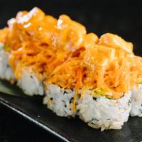 Highland Village Roll · Spicy crawfish, avocado, topped with spicy crab mix, salmon, scallion and spicy mayo baked.