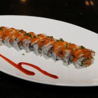 Phoenix Roll · Smoked salmon, jalapeno, tempura flake, topped with seared yellowtail, spicy mayo sauce and ...