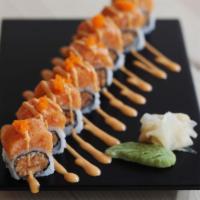 Island Girl Roll · 8 Pieces of Spicy tuna, spicy salmon and tempura flakes topped with spicy yellowtail scallion.
