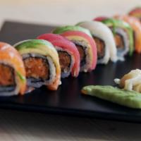 Rainbow Supreme Roll · 8 Pieces of Spicy crunchy tuna wrapped in assorted fish, avocado and tobiko.