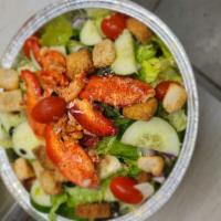 House Salad · Iceberg lettuce, tomatoes, red onions, cucumber, roasted peppers, olives, croutons, and grat...
