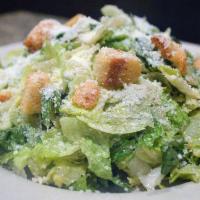 Caesar Salad · Homemade dressing, croutons and Parmesan.
