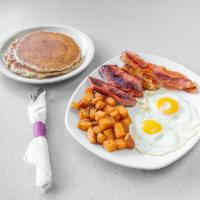 Meat Lover’s Combo · Two eggs, kielbasa, two smoked bacon strips, and two sausage links. Served with hash browns ...