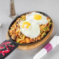 The Everything Skillet · Grilled ham, mushrooms, green peppers, tomatoes, onions, and American cheese with two eggs s...