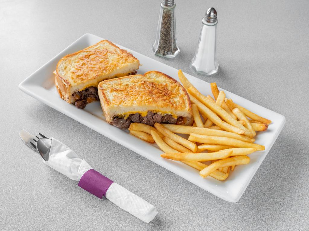Pot Roast Melt Sandwich · Tender braised beef, red onions and melted cheeses on sourdough bread