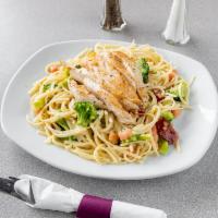 Chicken, Bacon, & Broccoli Pasta · Lemon herb chicken, bacon, broccoli, tomatoes, and Parmesan cheese on linguine with a lemon ...